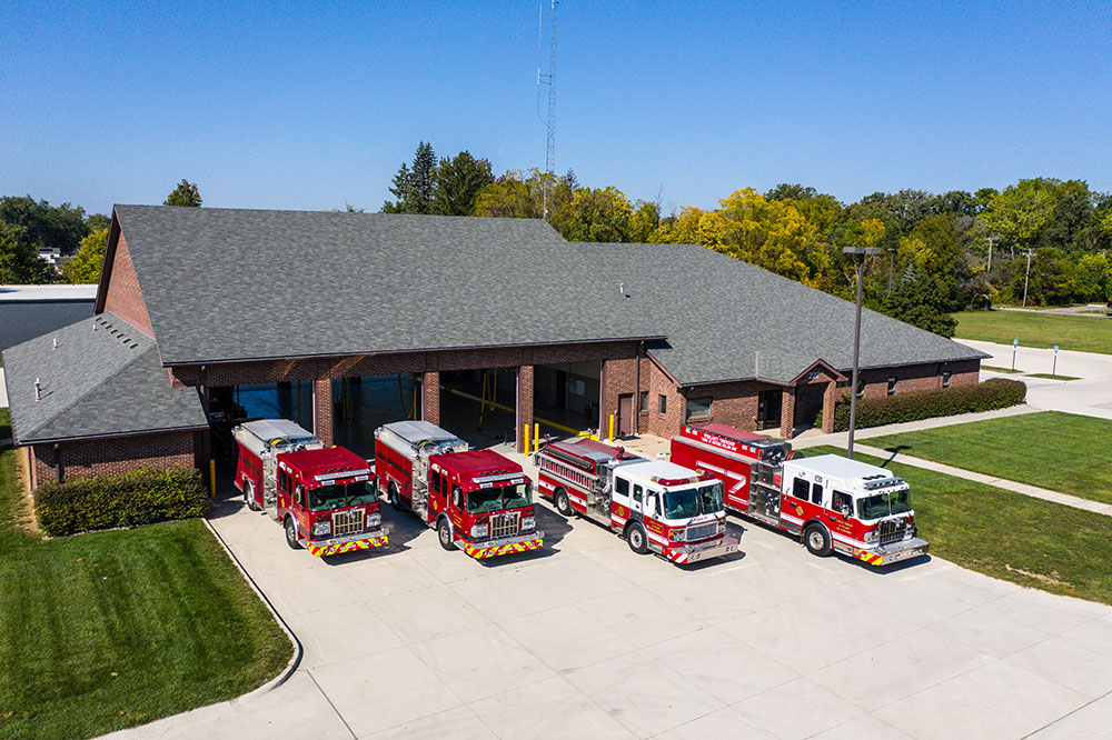 YTFD Main Station with 4 fire trucks parked outside