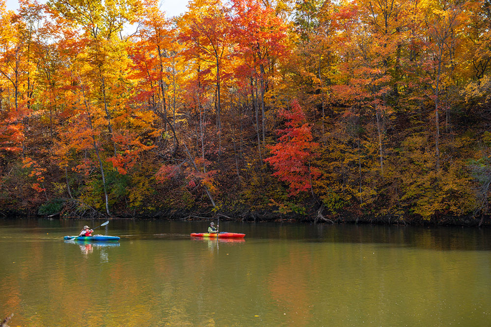 North Hydro Park in the fall with 2 kayaks on the water