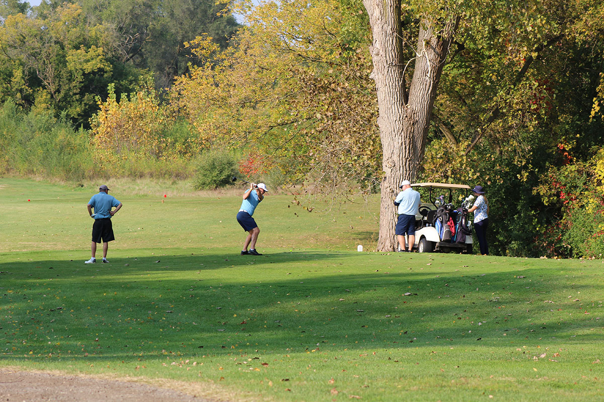 Golfers playing in Fore the Cause Serafinski Scholarship Golf Tournament