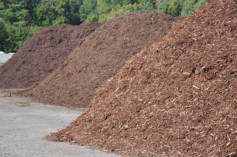 Three piles of mulch